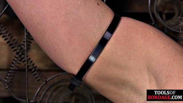 Tied up blonde pussyfucked with toy