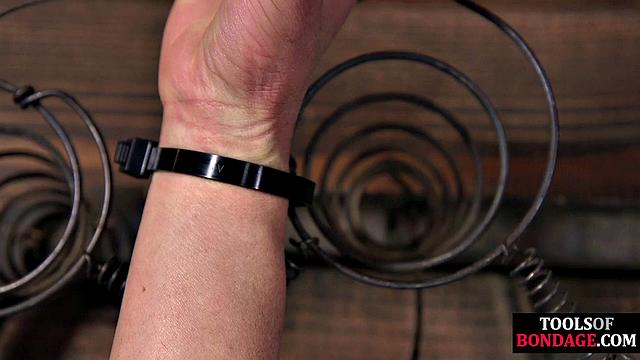 Tied up blonde pussyfucked with toy