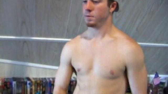 Cory Woodall watches a porn video near his skateboard. The camera takes us on a tour of Cory's body, which looks cuter than ever. When viewed from the floor up, this boy's balls are huge.