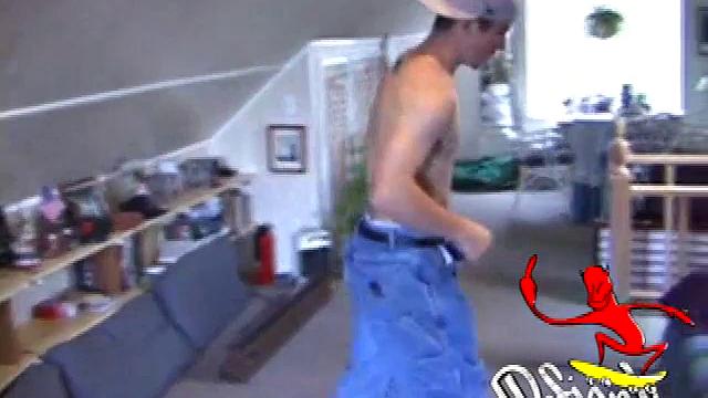 Cory Woodall watches a porn video near his skateboard. The camera takes us on a tour of Cory's body, which looks cuter than ever. When viewed from the floor up, this boy's balls are huge.