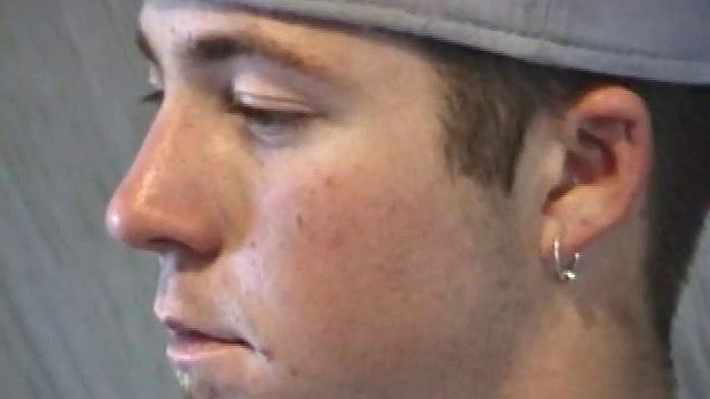 Cory Woodall watches a porn video near his skateboard. The camera takes us on a tour of Cory's body, which looks cuter than ever. When viewed from the floor up, this boy's balls are huge.