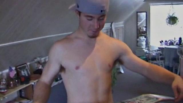 Cory Woodall watches a porn video near his skateboard. The camera takes us on a tour of Cory's body, which looks cuter than ever. When viewed from the floor up, this boy's balls are huge.