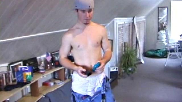 Cory Woodall watches a porn video near his skateboard. The camera takes us on a tour of Cory's body, which looks cuter than ever. When viewed from the floor up, this boy's balls are huge.