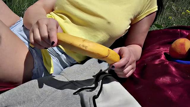 Watch this tattooed slut get fucked doggystyle in a hot outdoor food fight with her busty friend