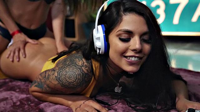 Watch these skinny Latina babes scissor, lick, and toy each other's tight assholes in the living room