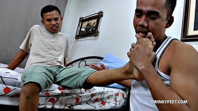Two foot fetish buddies who met online finally get together for some male foot action. These two Asian twinks love male feet. And they could not wait to lick and suck toes and sniff feet.
