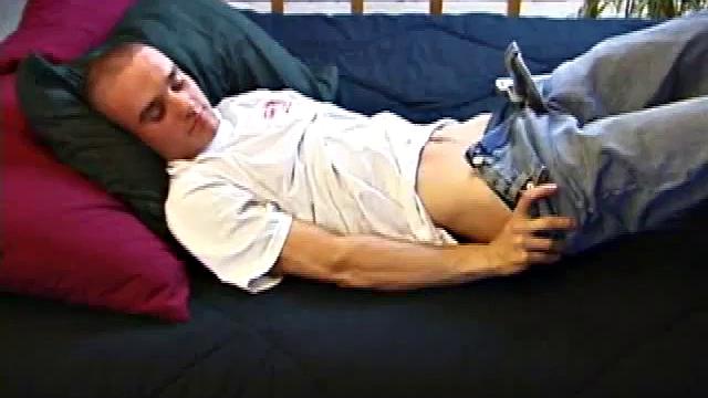 A shaved head and a naughty but nice looks belong to Kenny. Already shirtless, he pulls his pants and boxers down around his ankles and gets to work on his thick cock.