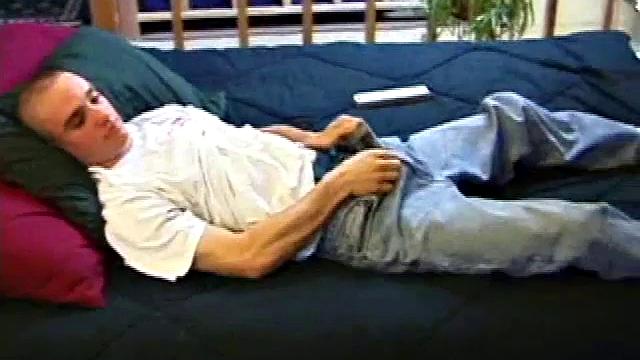 A shaved head and a naughty but nice looks belong to Kenny. Already shirtless, he pulls his pants and boxers down around his ankles and gets to work on his thick cock.