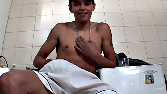 Seated on a stool, Latin twink Trend decides to jerk off. It isn't long before he has stripped off most of his clothes and is playing with himself. Then he pulls his hard cock out and starts stroking.