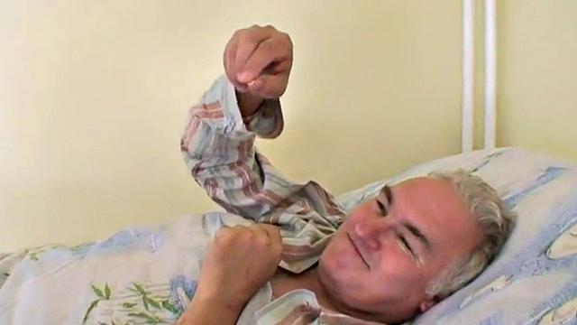 Sexy nurse rides grandpa's dick in hospital bed