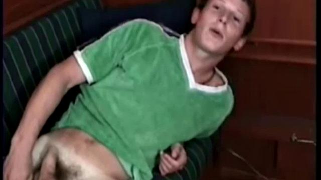 This absolutely adorable Irish boy arrives wearing his lucky green soccer shirt. After just a few minutes of stroking, he says he thinks he's cum already.