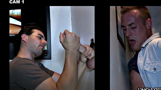 Gay stud sucks and strokes guy's cock in gloryhole