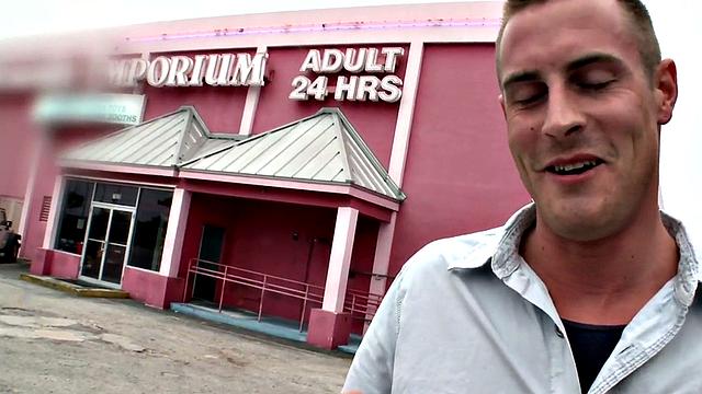 Gay stud sucks and strokes guy's cock in gloryhole