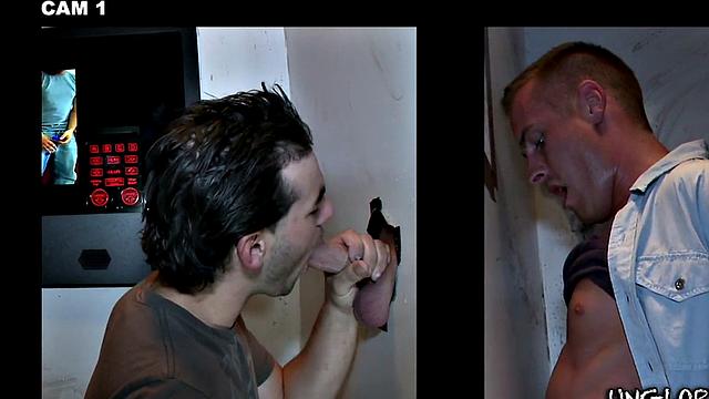 Gay stud sucks and strokes guy's cock in gloryhole