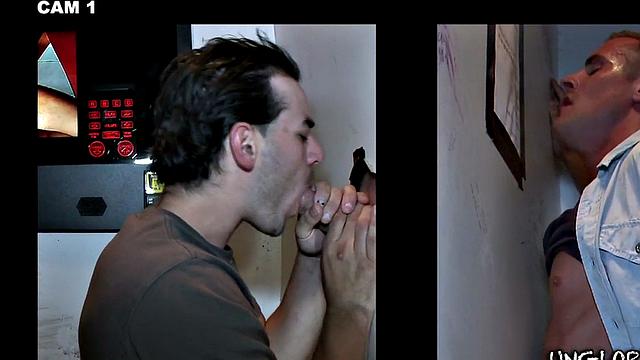Gay stud sucks and strokes guy's cock in gloryhole