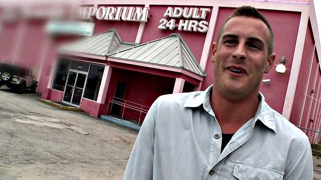 Gay stud sucks and strokes guy's cock in gloryhole