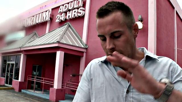 Gay stud sucks and strokes guy's cock in gloryhole