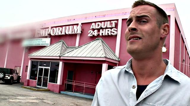 Gay stud sucks and strokes guy's cock in gloryhole