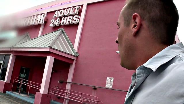 Gay stud sucks and strokes guy's cock in gloryhole