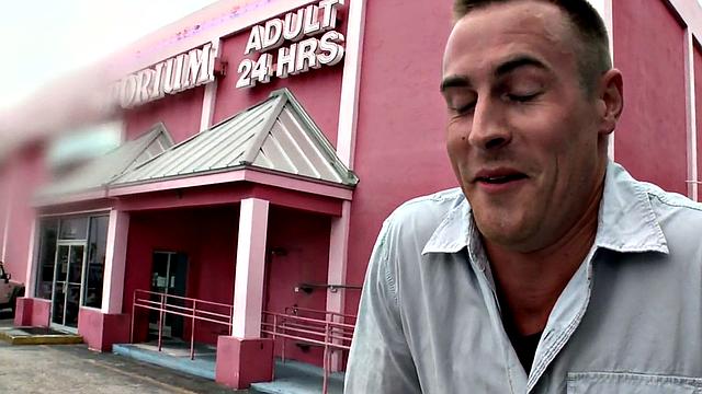 Gay stud sucks and strokes guy's cock in gloryhole