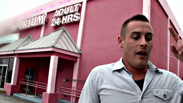 Gay stud sucks and strokes guy's cock in gloryhole