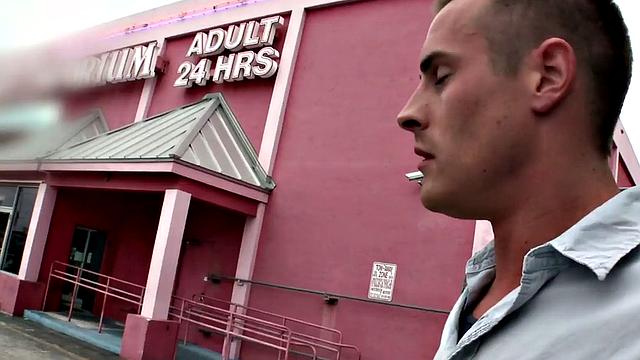 Gay stud sucks and strokes guy's cock in gloryhole