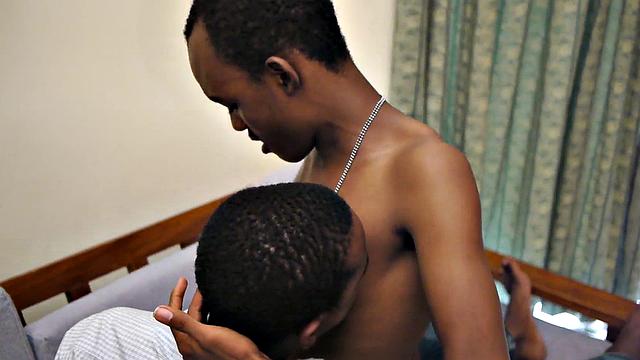 Ebony twink jerks uncut cock while barebacked