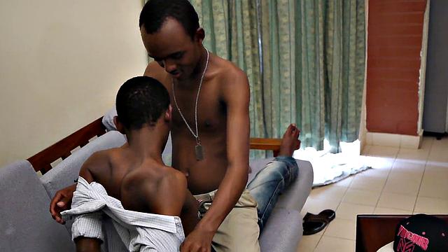 Ebony twink jerks uncut cock while barebacked