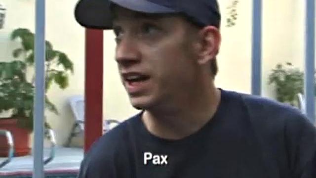 Pax skates in jeans, boxers, visor, and a black Bruce Lee t-shirt. Back on his bed, he loses all, looking more inviting when we see his blonde hair, tattoos, and stiff cock.