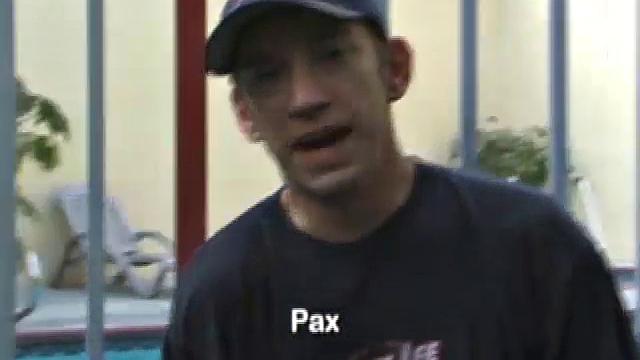 Pax skates in jeans, boxers, visor, and a black Bruce Lee t-shirt. Back on his bed, he loses all, looking more inviting when we see his blonde hair, tattoos, and stiff cock.