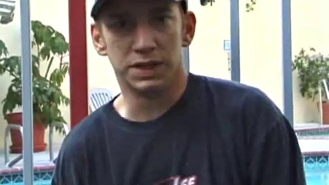 Pax skates in jeans, boxers, visor, and a black Bruce Lee t-shirt. Back on his bed, he loses all, looking more inviting when we see his blonde hair, tattoos, and stiff cock.