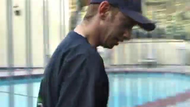 Pax skates in jeans, boxers, visor, and a black Bruce Lee t-shirt. Back on his bed, he loses all, looking more inviting when we see his blonde hair, tattoos, and stiff cock.