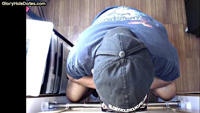 Gloryhole DILF sucks cock at home in amateur video