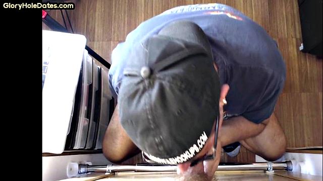 Gloryhole DILF sucks cock at home in amateur video