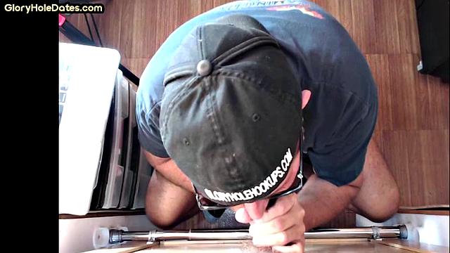 Gloryhole DILF sucks cock at home in amateur video