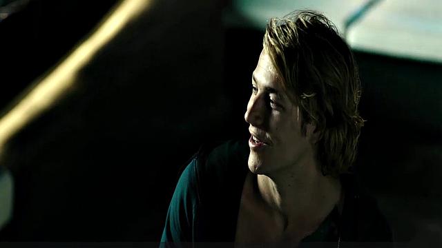 Teresa Palmer gets down and dirty in the sun with her bikini on!