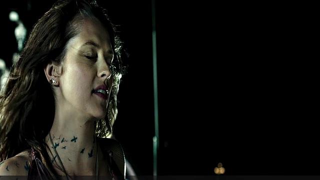 Teresa Palmer gets down and dirty in the sun with her bikini on!