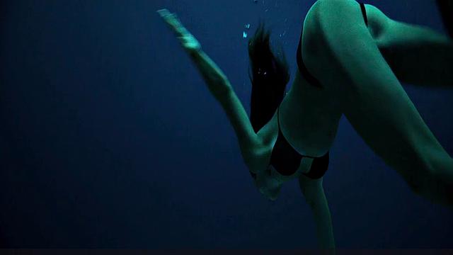 Teresa Palmer gets down and dirty in the sun with her bikini on!