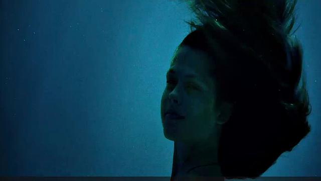 Teresa Palmer gets down and dirty in the sun with her bikini on!