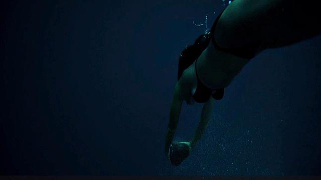 Teresa Palmer gets down and dirty in the sun with her bikini on!