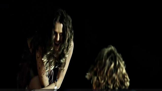 Teresa Palmer gets down and dirty in the sun with her bikini on!