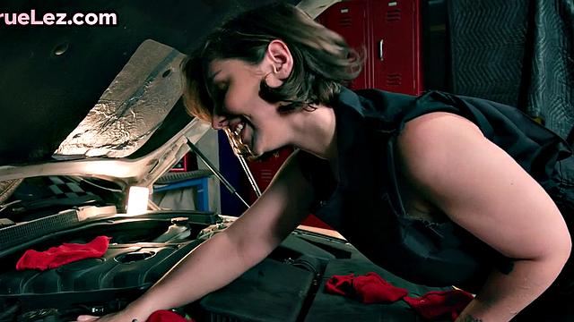 Stunning lesbian couple having fun in garage