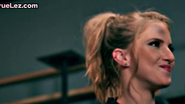 Stunning lesbian couple having fun in garage