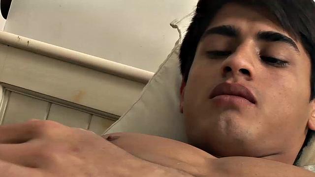Fabio, a slim and smooth Latin boy, jerks off as he wakes up horny
