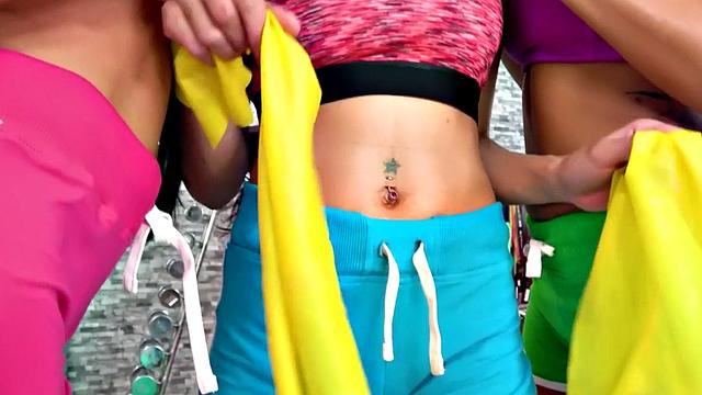 Gym lesbians dildo in threesome after working out