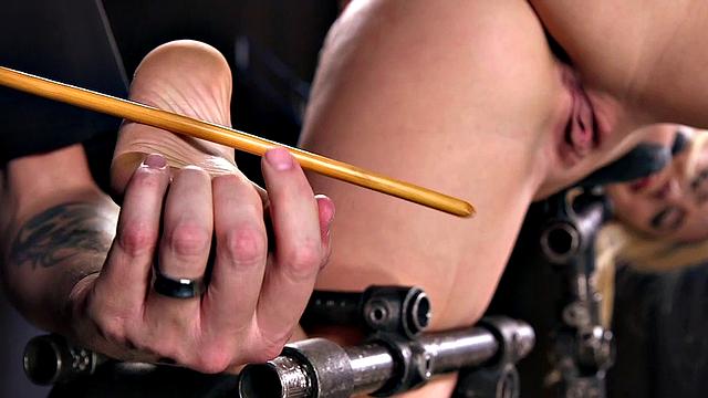 Submissive babe tormented in bastinado casting
