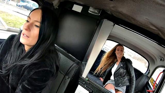 Taxi driving sappho has oral pleasure with brunette babe