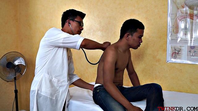 Asian patient analdrilled by doc