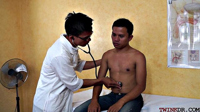 Asian patient analdrilled by doc