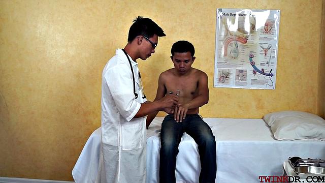 Asian patient analdrilled by doc